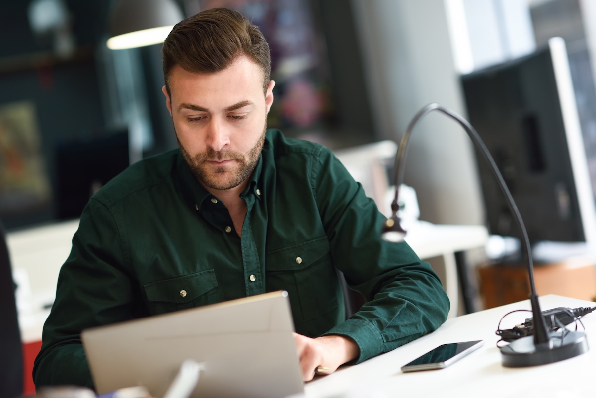 man-working-on-laptop-at-modern-desk-2026-01-09-07-34-33-utc copy.jpg